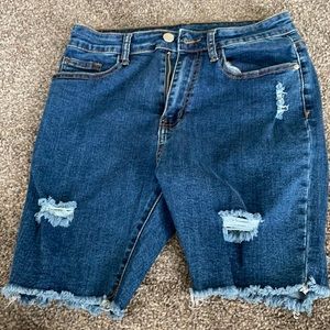 Shein. Size M. Manufactured ripped shorts.